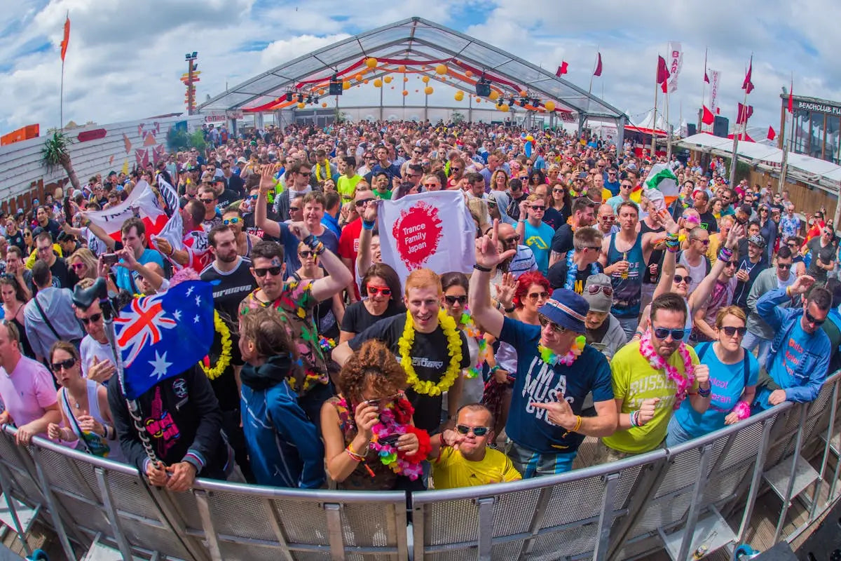 A sleek black smartwatch with a round face displaying time, date, and fitness stats on a vibrant screen, accompanied by a textured silicone band.