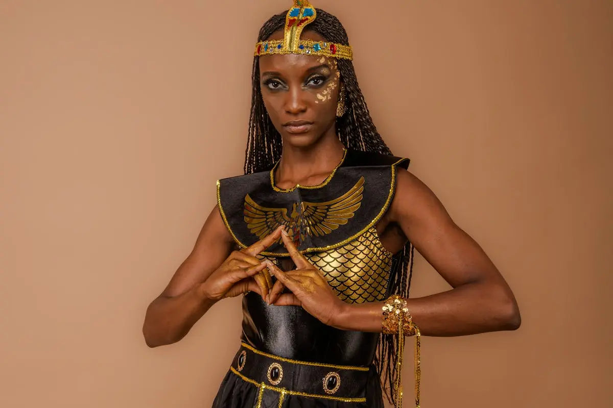 A sleek, modern smartwatch displaying a digital clock face with health tracking icons, on a glossy black band, placed on a minimalist white surface.