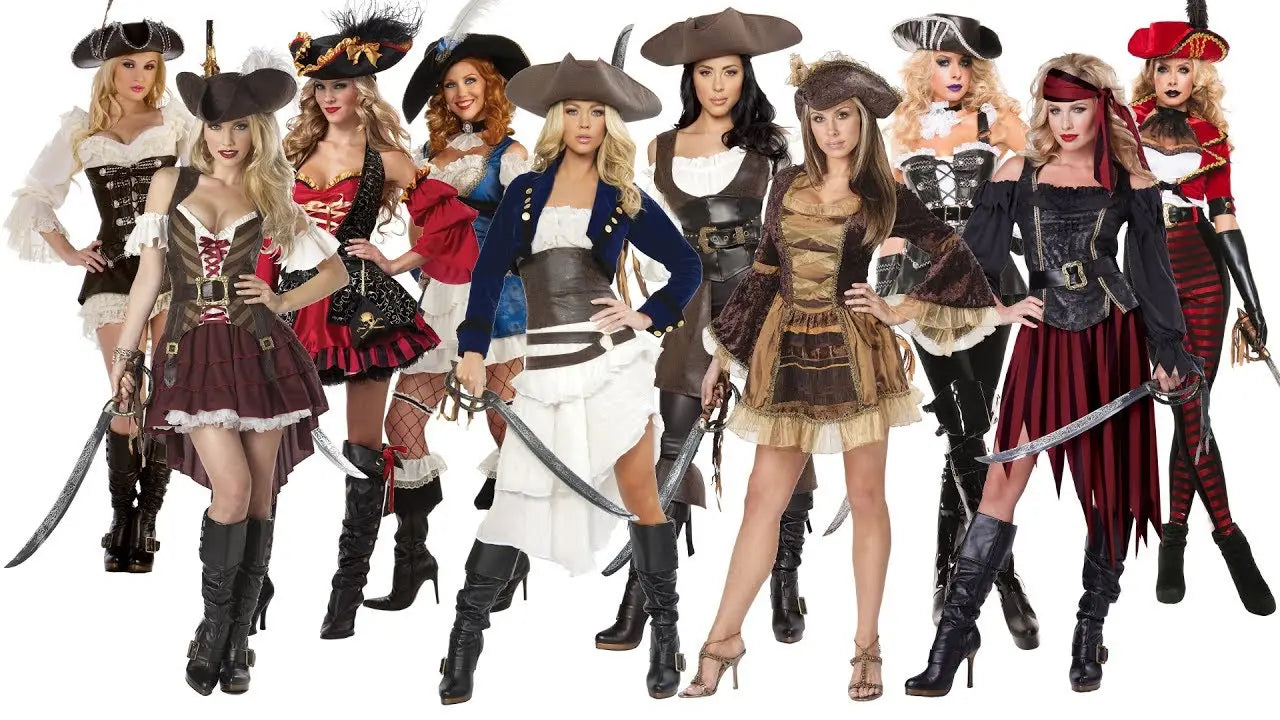 A group of women in pirate-themed clothing, with two holding swords, wearing various garments and pirate hats, showcasing a costume collection.