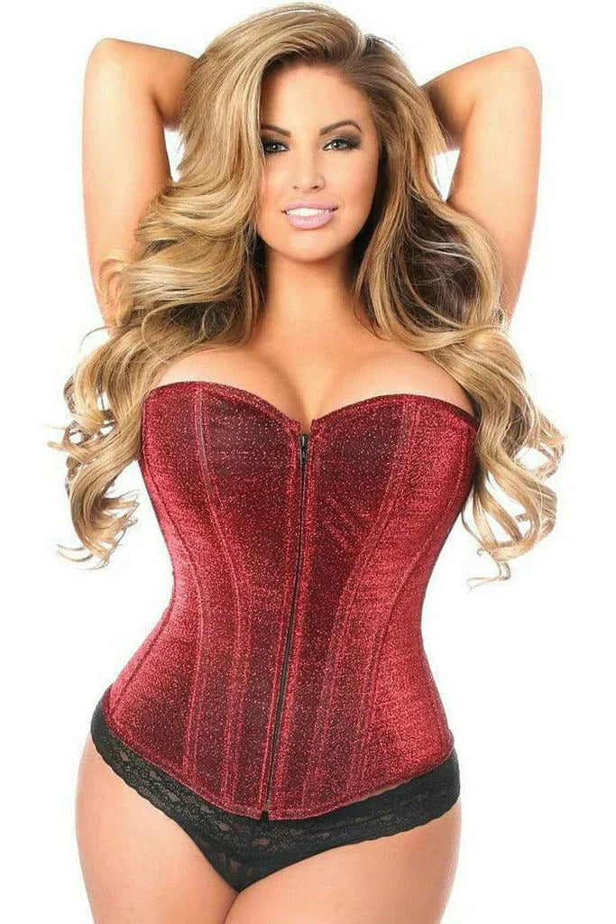 A woman in a red corset poses for a fashion photo shoot, highlighting the garment's detailed design and the model's elegant posture.