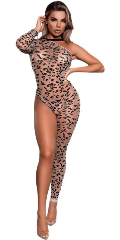 A woman modeling a leotard, with one hand near her ear, showcased in a professional fashion photo shoot setting.