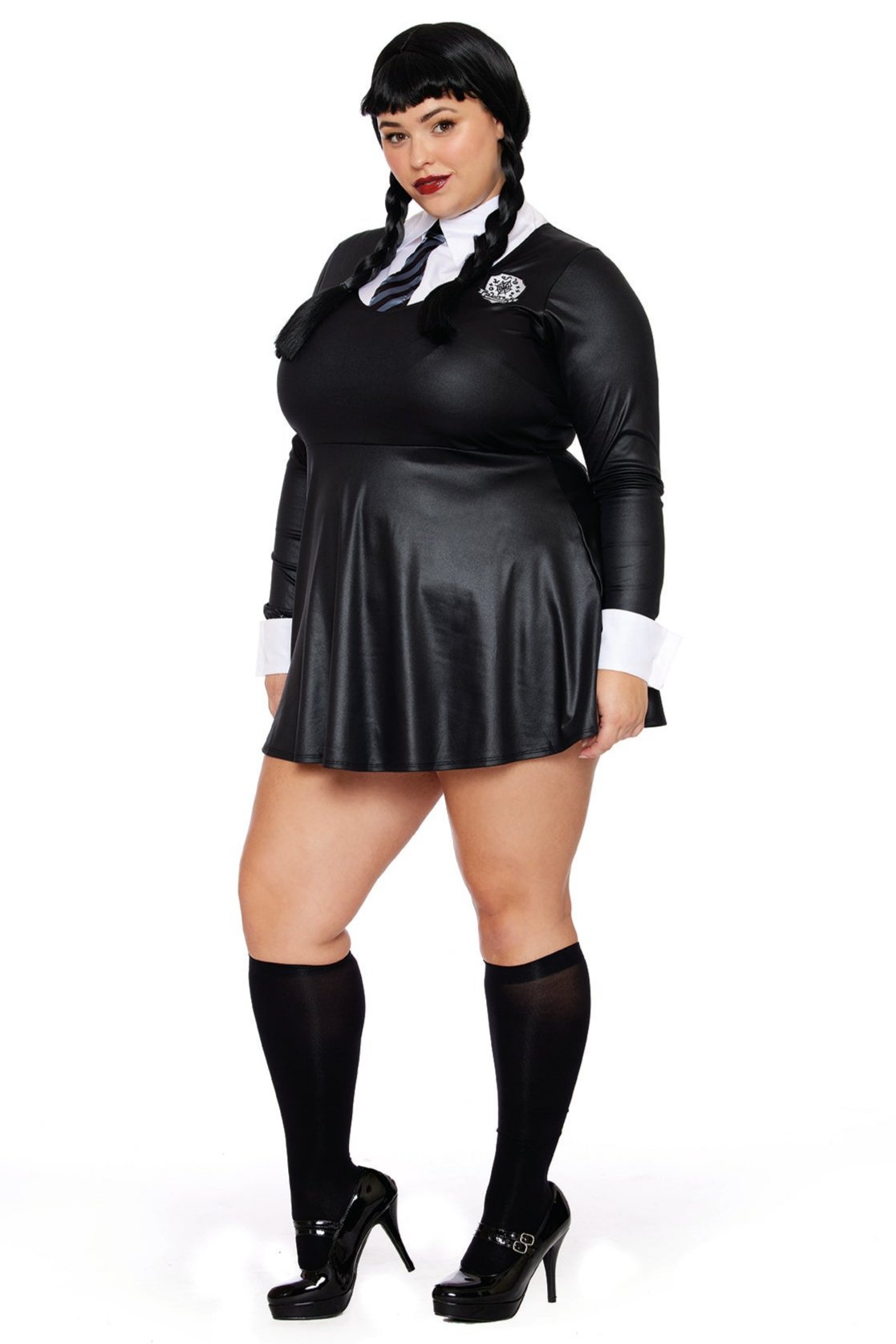 A woman with braided hair is wearing the Dark Scholar Plus Size Rebel Costume, featuring a Gothic Schoolgirl black dress with a white collar and cuffs, complemented by knee-high black socks and black heels.