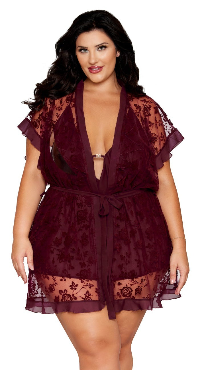 Plus Size Floral flocked mesh and chiffon robe and chemise set with flounce details, modeled by a woman, highlighting plunging neckline and adjustable crisscross straps.
