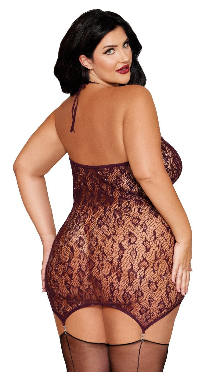 Woman modeling Plus Size Leopard pattern knitted seamless fishnet chemise with rhinestones, halter neckline, metal trim, and garter-shaped hem, paired with separate thigh highs.
