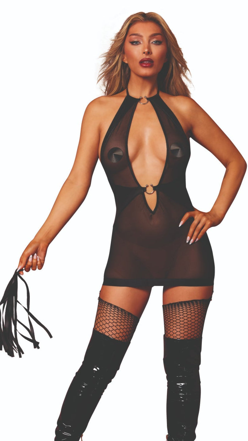 Woman modeling a stretch mesh and faux-leather garter slip set with halter neckline, attached belt, and side garters, paired with thigh highs and pasties.