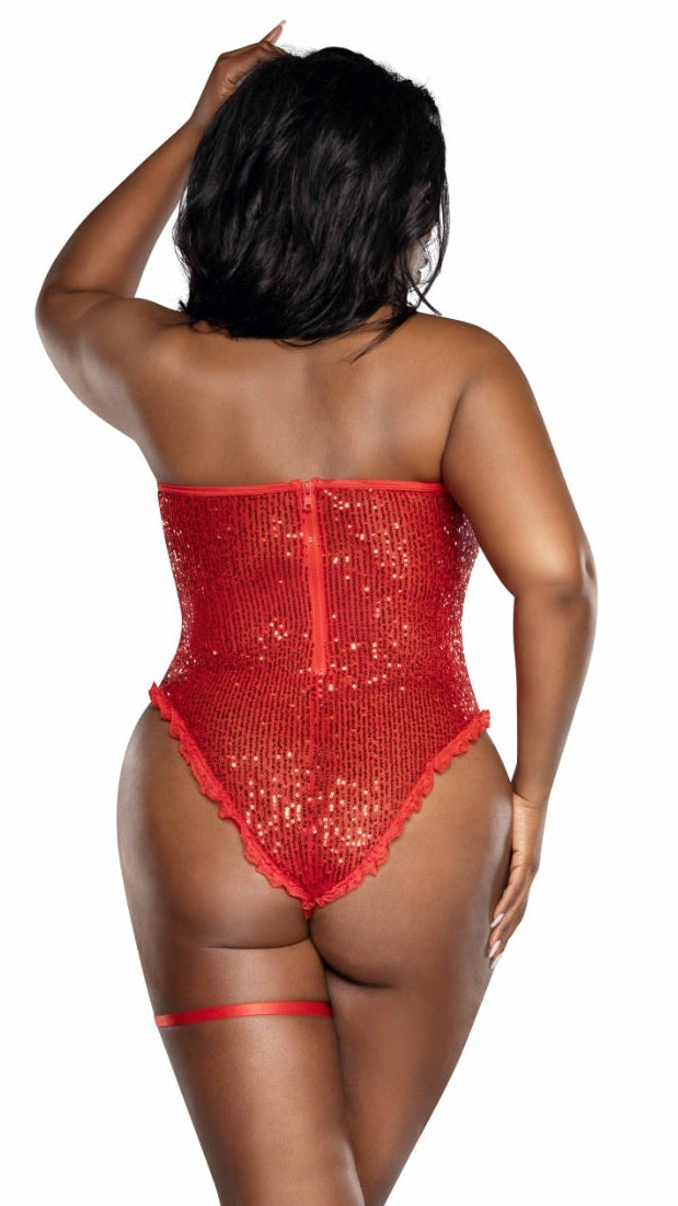 Woman in strapless Plus Size Sequined teddy with heart cutouts and ruffled edges, paired with matching thigh strap and glossy stilettos, highlighting the garment's intricate sequin detailing and elegant silhouette.