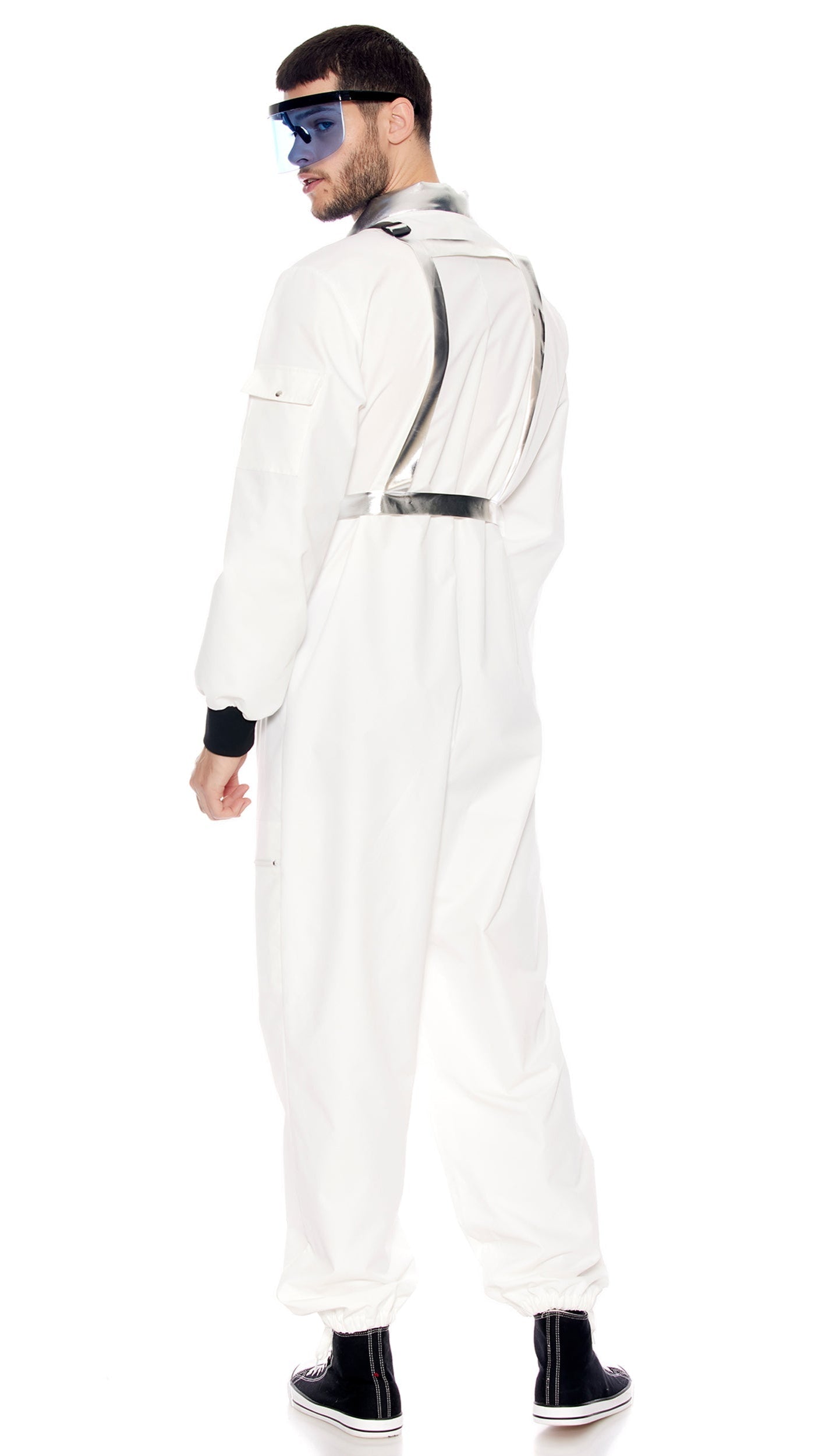 Take Off Men's Astronaut Costume featuring a close-up of a black and white shoe, part of the outfit's detailed design and space-themed attire.