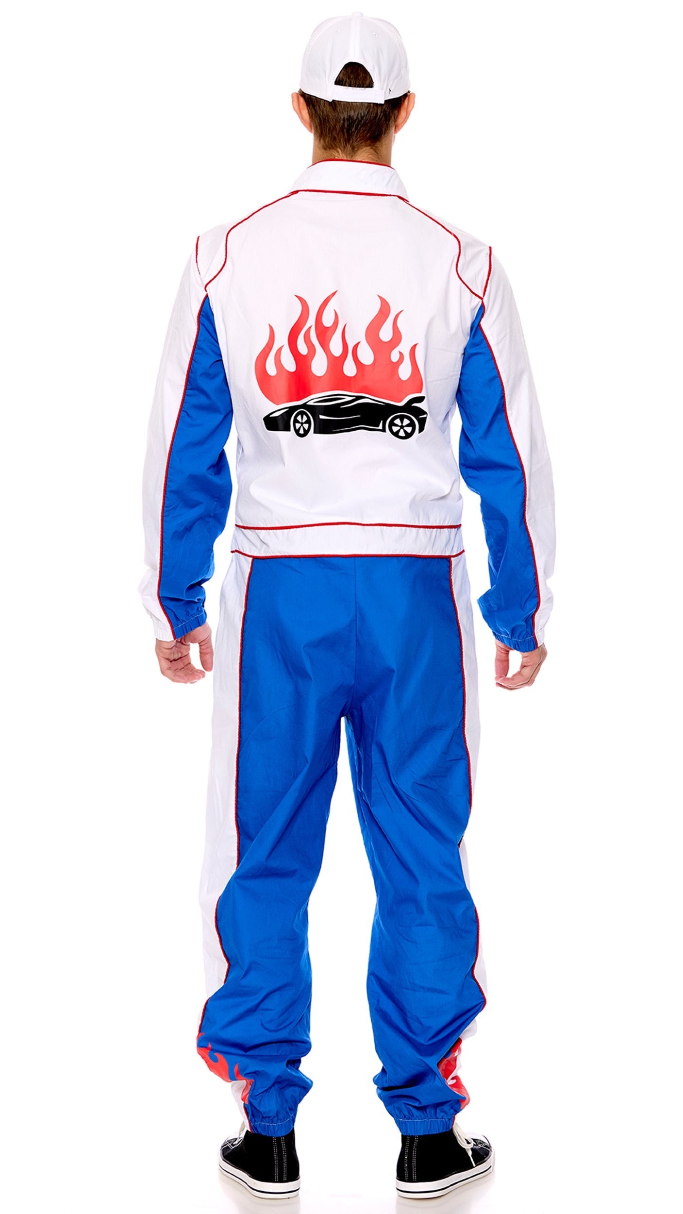Formula Won Men's Racer Costume: close-up of black shoes with the costume's zip-front jogger jumpsuit, featuring patches, and glimpses of matching hat and glasses.