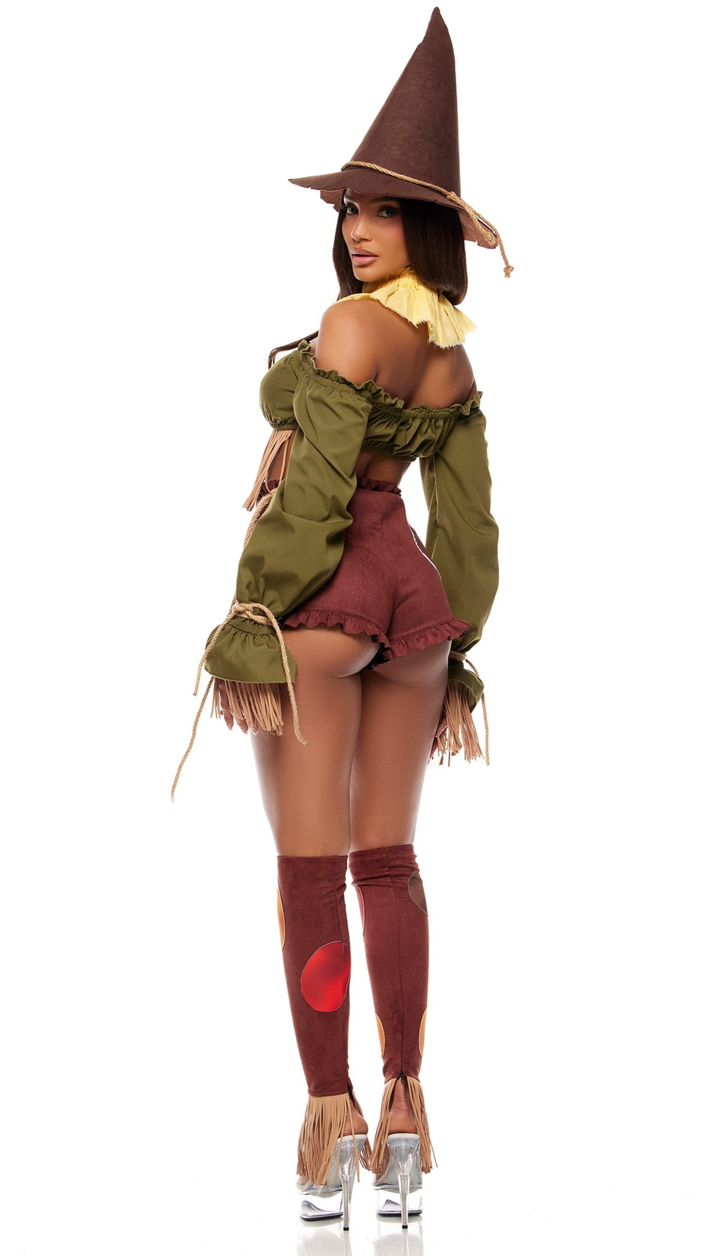 Woman wearing the Straw For Brains Storybook Costume, featuring a ruffle crop top, faux suede shorts, leg accessories, and a pointed hat.