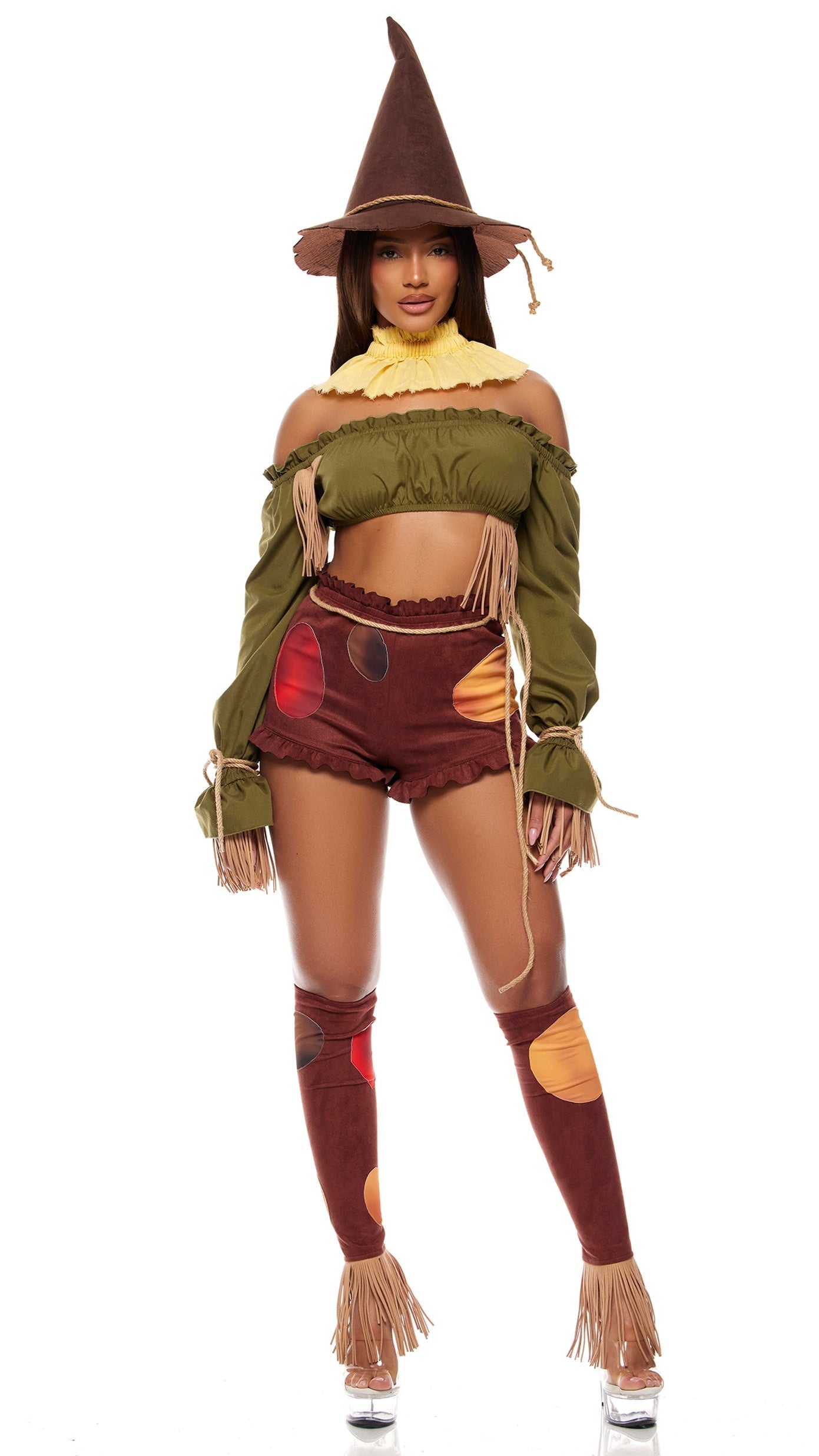 Woman in Straw For Brains Storybook Costume with ruffle crop top, faux suede shorts, fringe accents, pointed hat, and matching leg accessories.