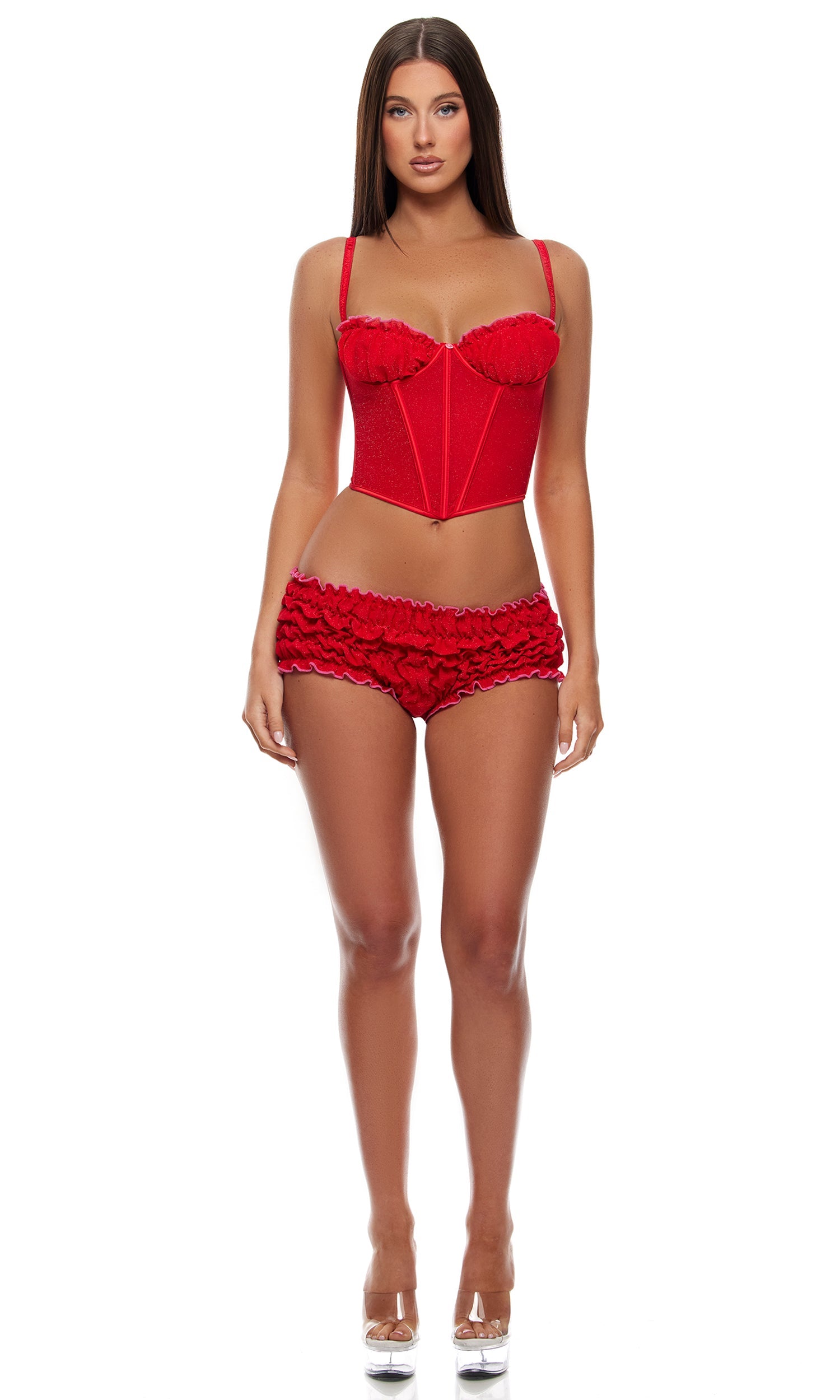 Shimmer Nights Ruched Bustier Lingerie Set, featuring a ruched underwire bustier with boning, lettuce edge detail, and mini rosebud accent, paired with matching ruched bloomer shorts and clear platform sandals.