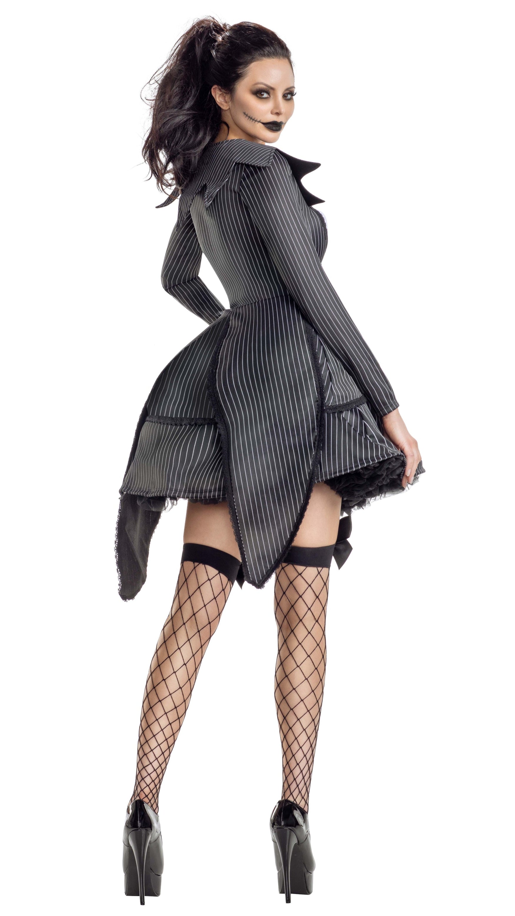 Close-up of the Bad Dreams Babe dress showcasing its pin-striped fabric, pointy collar, and bow details, with a focus on fashion-forward design elements.