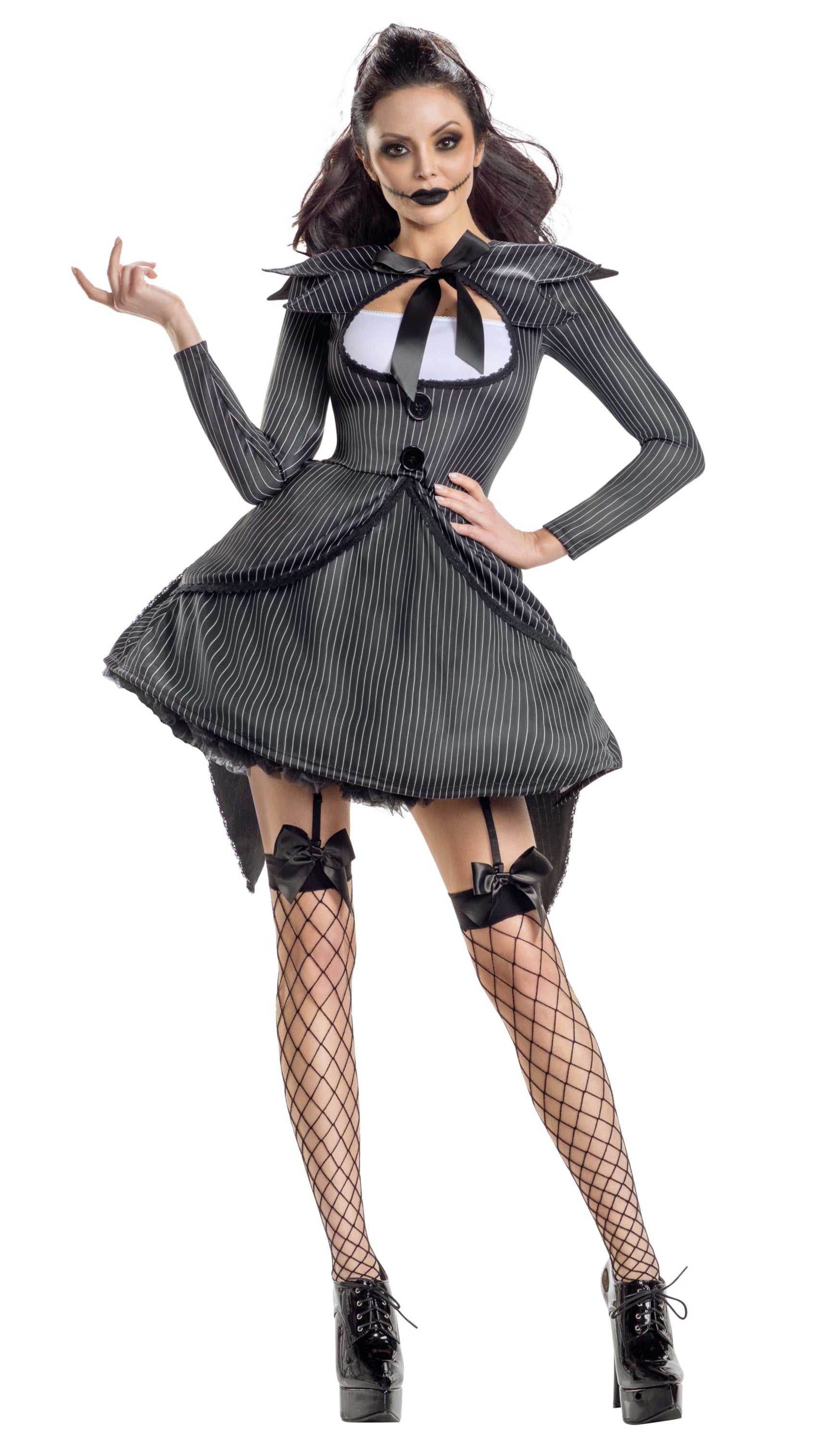 Bad Dreams Babe dress with pointy collar, black buttons, bow details, and built-in coattails. Close-up of shiny black high heel complements the outfit.