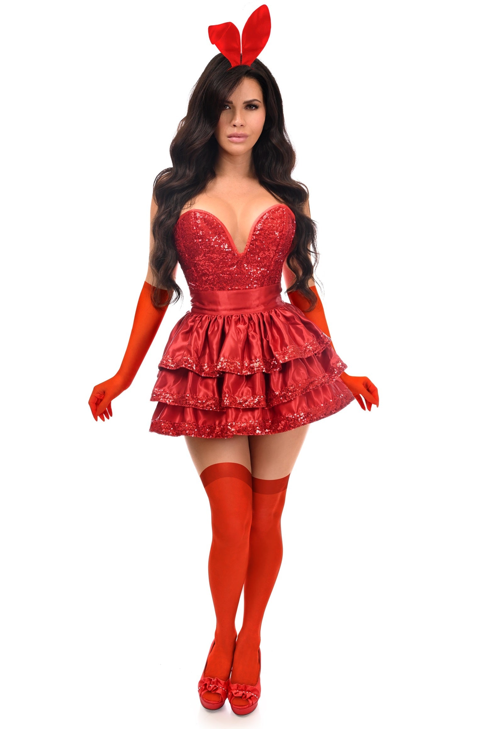 Woman models the Fabulous 5 PC Red Sequin Playmate Bunny Corset Costume, featuring a fitted sequin bodice, ruffled mini-skirt, opera gloves, thigh-high stockings, and bunny ears, all in coordinated red.