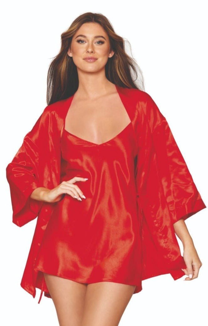 Woman modeling the Elegant Satin Robe and Chemise Set, featuring adjustable crisscross straps and a low back, exuding sophisticated fashion and style.