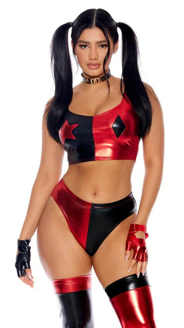 Woman modeling the Sexy Puddin Jokester Comic Book Halloween Costume featuring a star-studded crop top, matching panty, leg accessories, PUDDIN choker, and fingerless gloves.