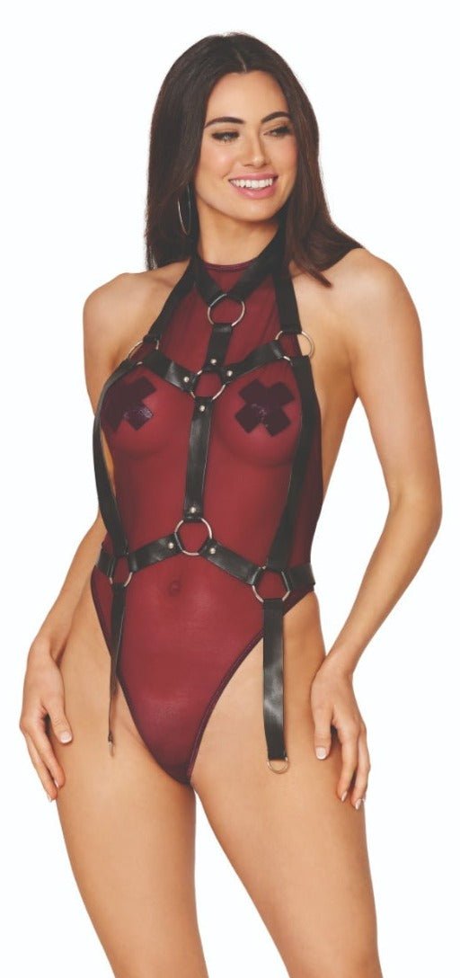 Woman modeling Soft Mesh Teddy with Faux-Leather Harness, featuring a halter neck design and adjustable straps, highlighting its edgy, rebellious style.