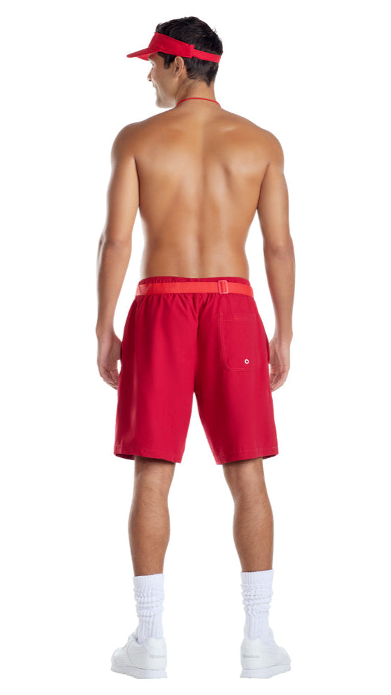 Man wearing the Men’s Lifeguard Hunk Halloween Costume, featuring knee-length red shorts, a matching visor, scrunched white socks, and white athletic shoes, embodying a classic TV-inspired beach rescue look.