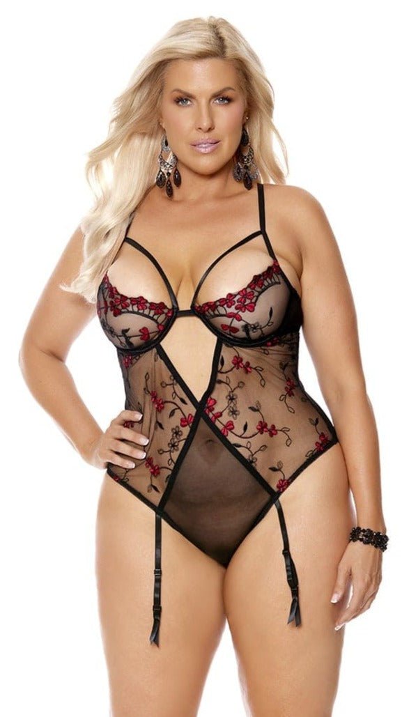 Black Mesh Red Embroidered Plus Size Teddy features a model showcasing intricate red embroidery, keyhole front, strappy details, underwire cups, and adjustable garters for a confident look.