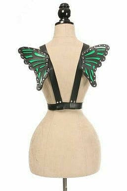 Mannequin showcasing Black With Green Vegan Leather Butterfly Wings with adjustable straps and gold hardware, emphasizing a bold and edgy fashion statement.