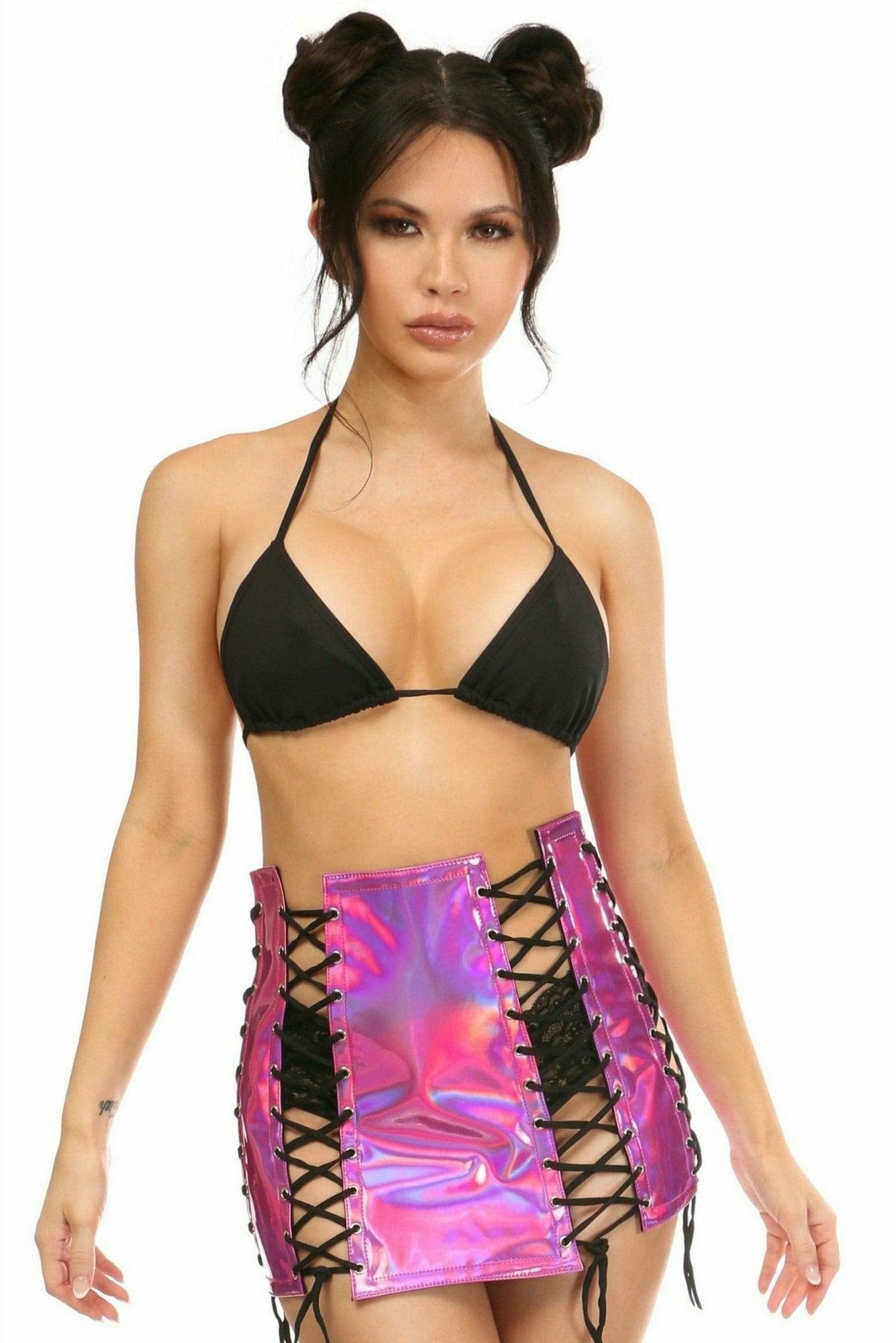 Woman modeling Fuchsia Hologram Lace-Up Skirt with holographic fabric, stretch bodycon fit, and lace-up detail, highlighted by a back zipper closure.