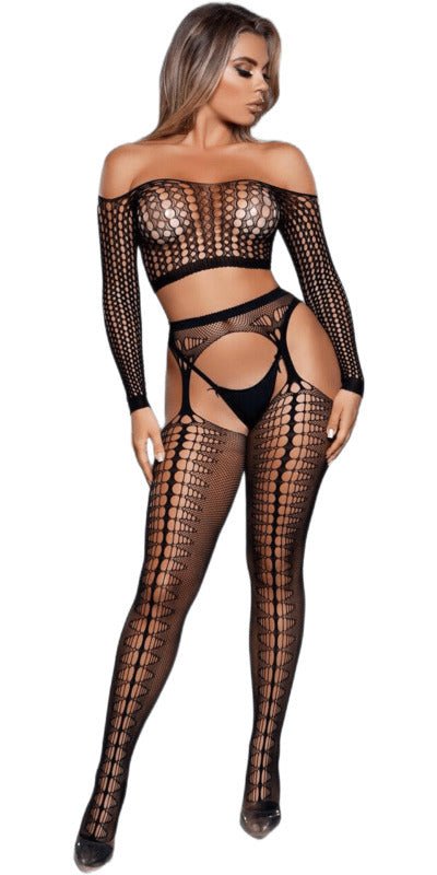 Woman wearing the Sex Run The World Garter Bodystocking, featuring black fishnet tights with attached garters and an off-shoulder top, showcasing a bold, confident style.