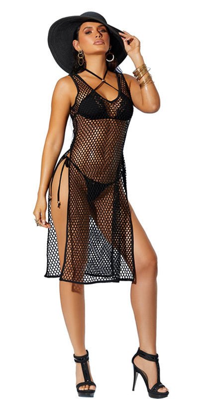 Woman in Sexy Fishnet Swim Cover-up Dress with Side Slits, wearing a black hat, showcasing fashion-forward beach style.