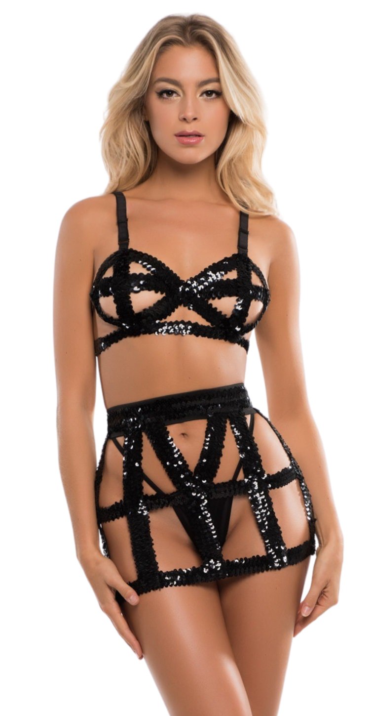 Woman modeling Sexy New Years Sequin Bra and Ultra Mini Skirt, showcasing sparkly sequin bands and high-waisted design, highlighting curves with adjustable hooks for perfect fit.