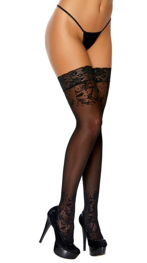 Woman modeling sheer thigh-highs with floral top design, paired with black lingerie and high heels, emphasizing a sultry and romantic allure.