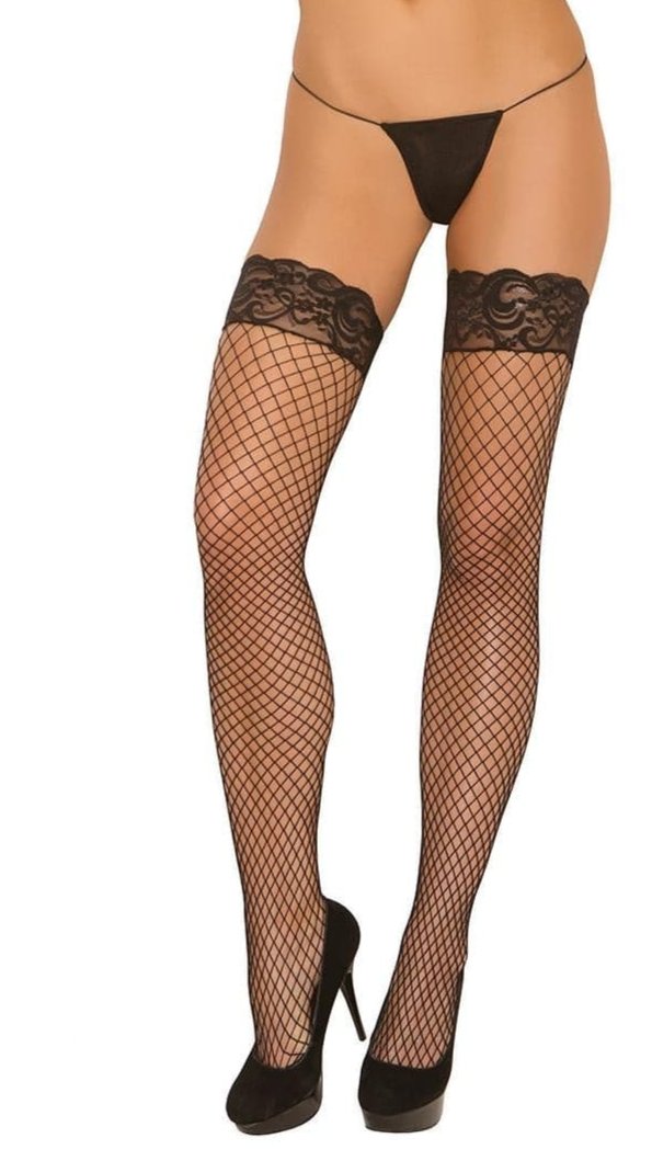 Woman wearing Stay Up Diamond Net Thigh High Stockings with silicone lace top for secure fit, showcasing a stylish lingerie set with fishnet design.