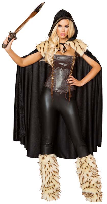 A woman in a costume holds a sword, wearing furry gloves, with a cat visible in the background.