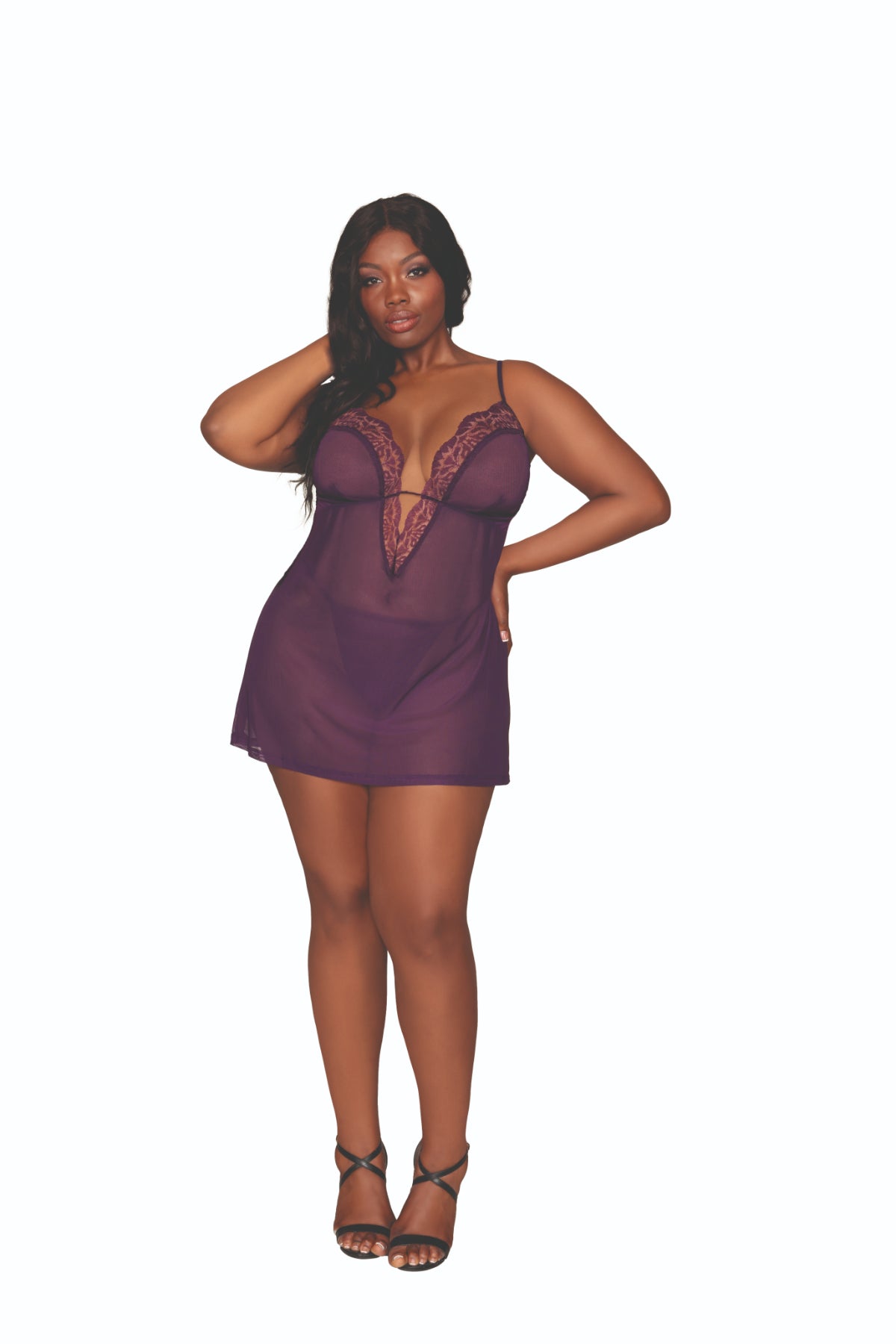 Plus size model wearing sheer purple chemise from robe collection.