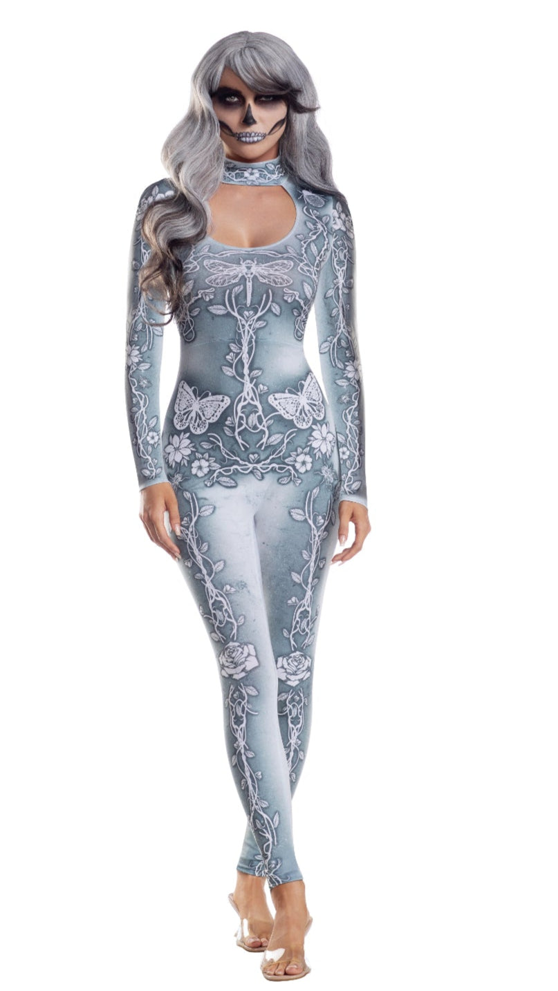 Woman modeling the Beautiful Bones sublimated knit jumpsuit, showcasing its sleek design and fit, crafted from polyester and spandex, perfect for fashion-forward styling.