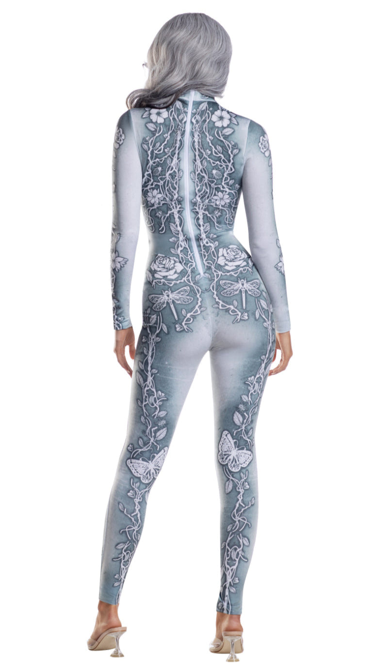 Beautiful Bones jumpsuit: Close-up of a woman's foot and back, showcasing the knit, sublimated one-piece set. Made of 95% polyester and 5% spandex.