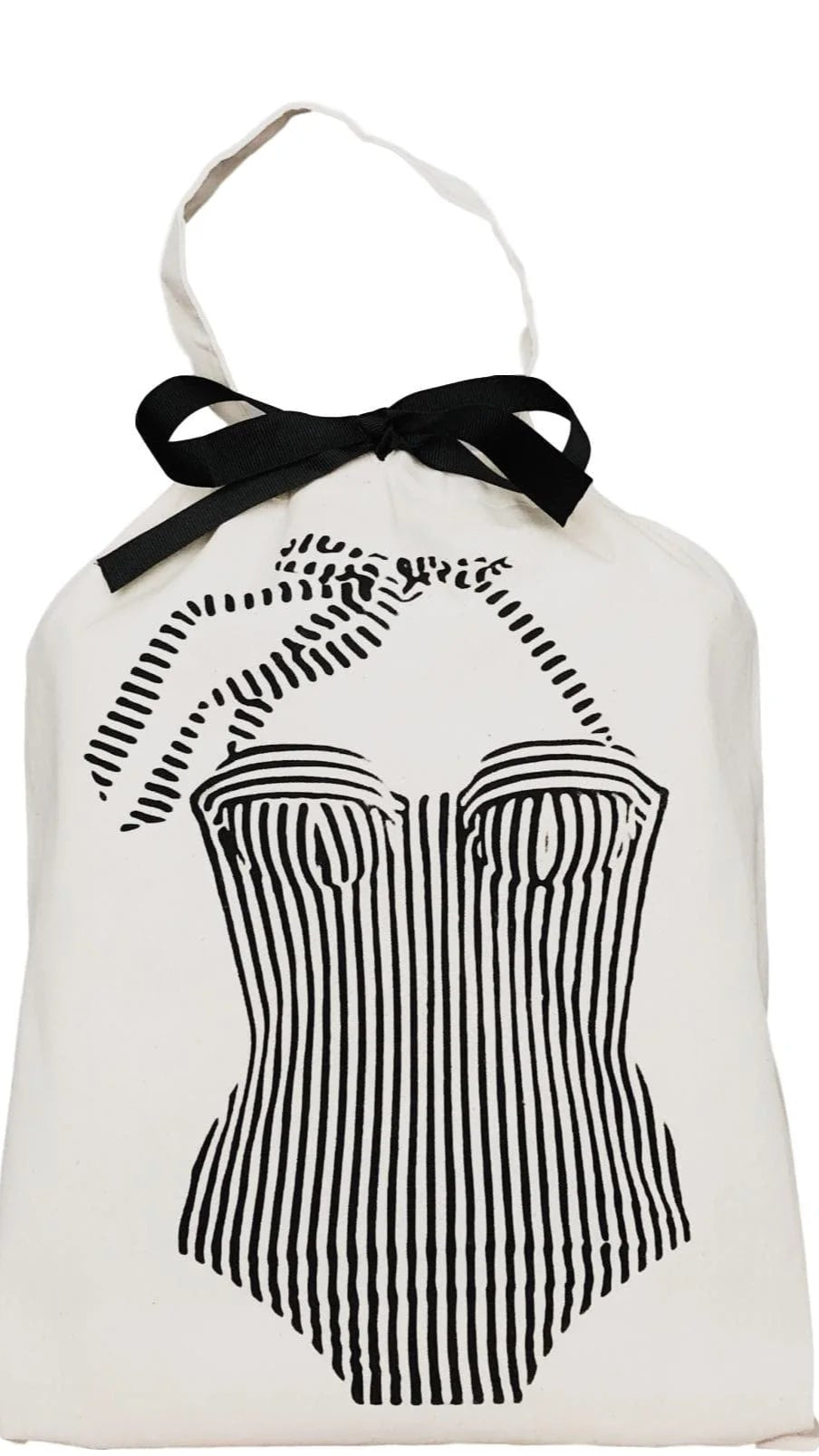 The Feeling Adventurous Bundle is encased in a small white drawstring bag adorned with a bold black-and-white graphic of a one-piece swimsuit, tied neatly with a black ribbon.
