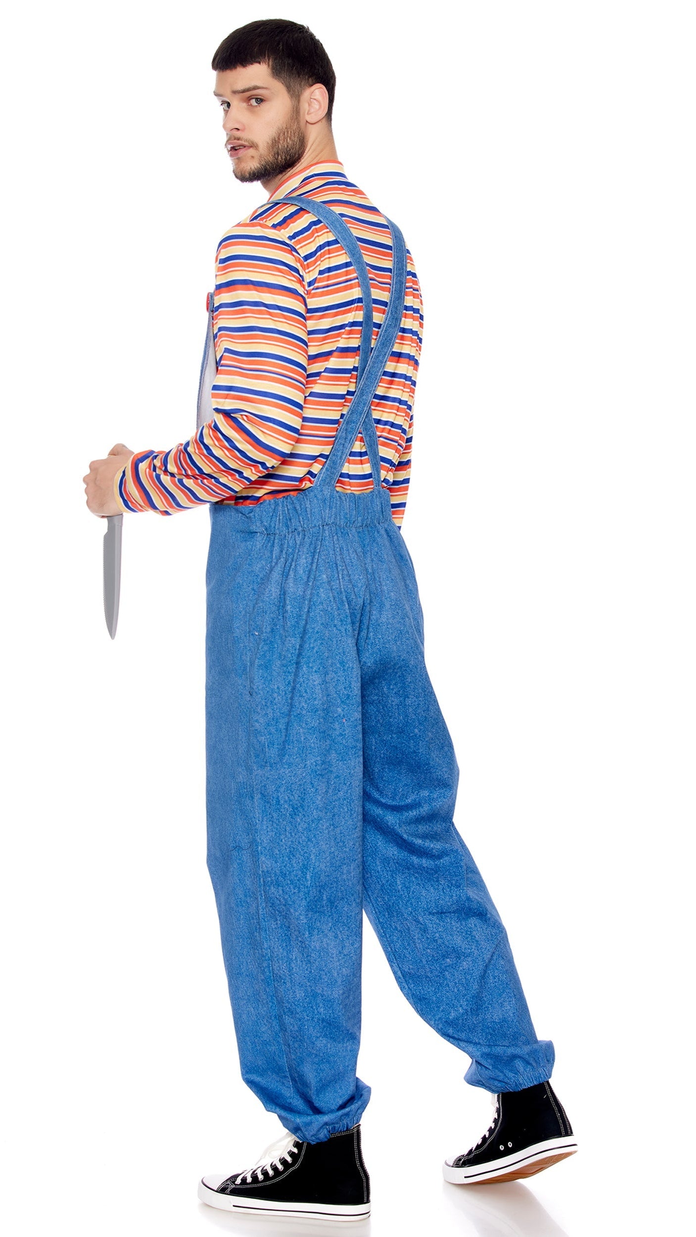 Man wearing One of The Good Guys costume with striped shirt, overalls featuring WANNA PLAY? text, and holding a prop knife.