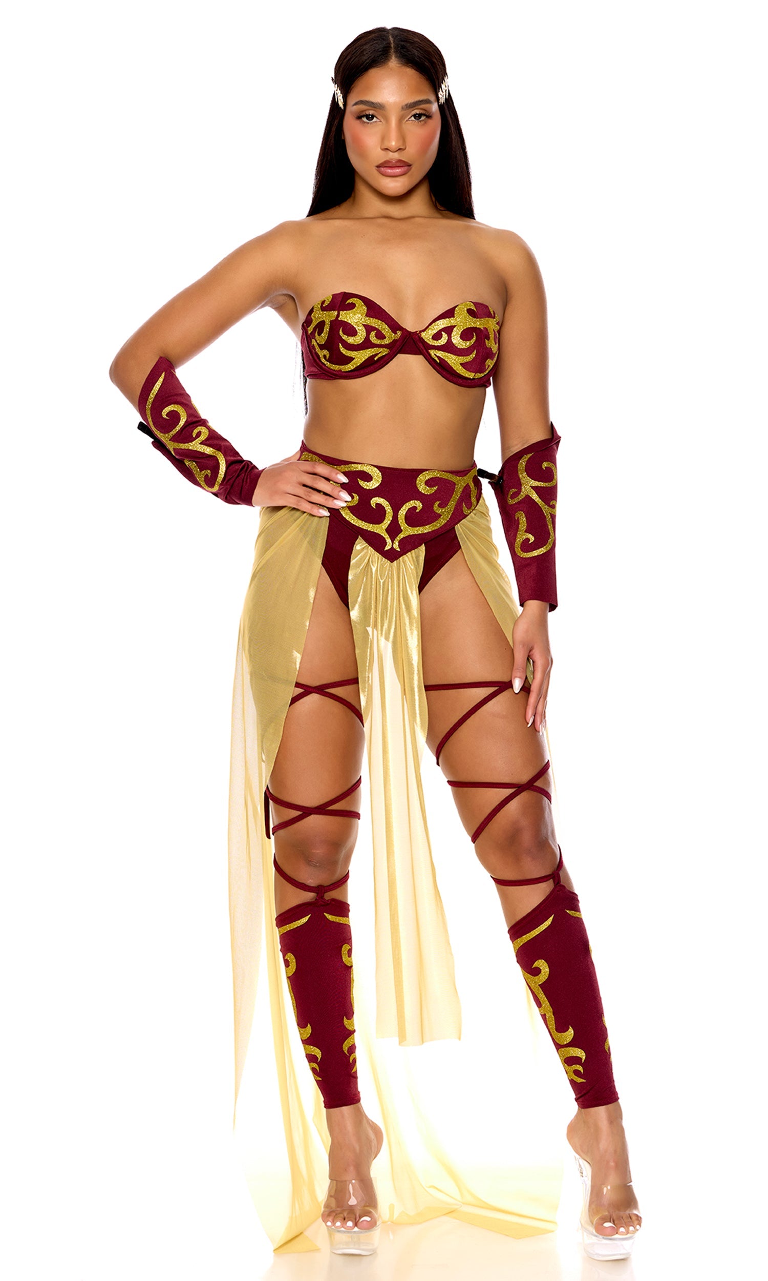 Woman modeling the Imperial Roman Gladiator Outfit for Women, featuring a strapless bra, M-slit skirt, lace-up leg accessories, gauntlets, and headpiece.