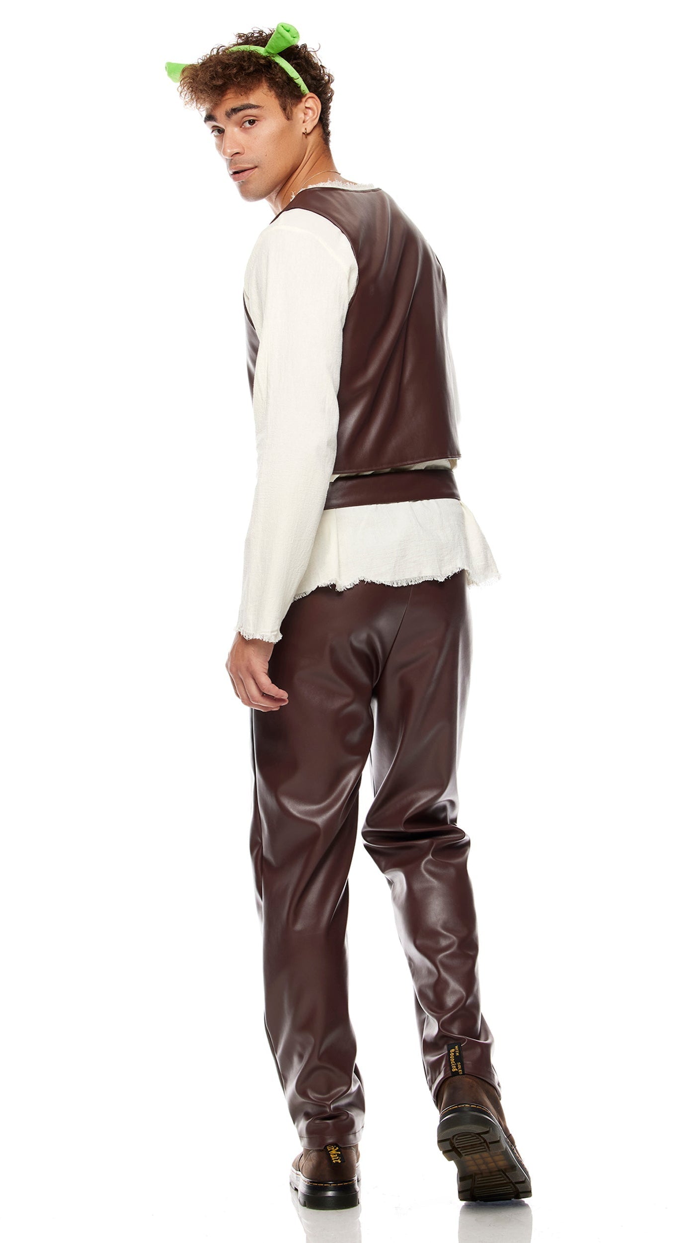 Swamp King Movie Character Costume shown with a close-up of a hand holding the faux leather vest, boot detail, and the ogre ear headband.
