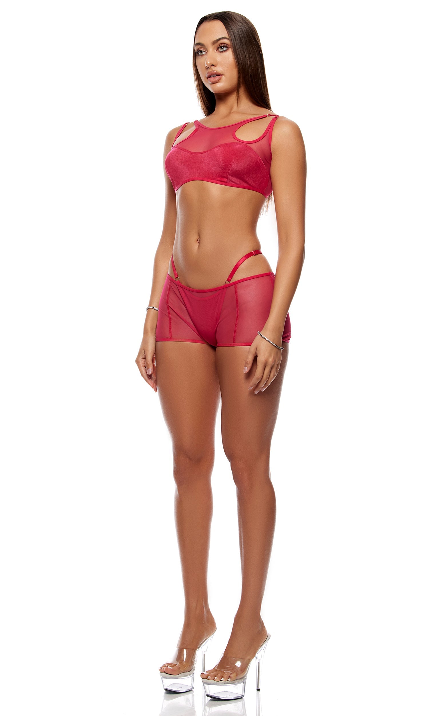 Model in Layers To This Mesh and Knit Bra Top and Shorts Lingerie Set, featuring semi-sheer cut-out bralette, high-waisted mesh shorts, and platform heels, accessorized with thin bracelets.