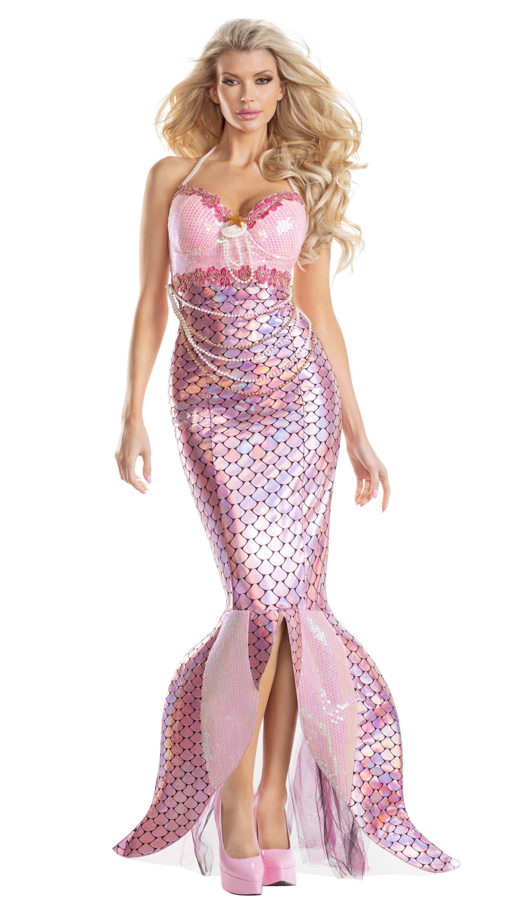 Blushing Beauty Mermaid dress featuring sequin embroidery, faux-pearls, and shell accents, modeled by a woman with long blonde hair, paired with pink high-heeled shoes.