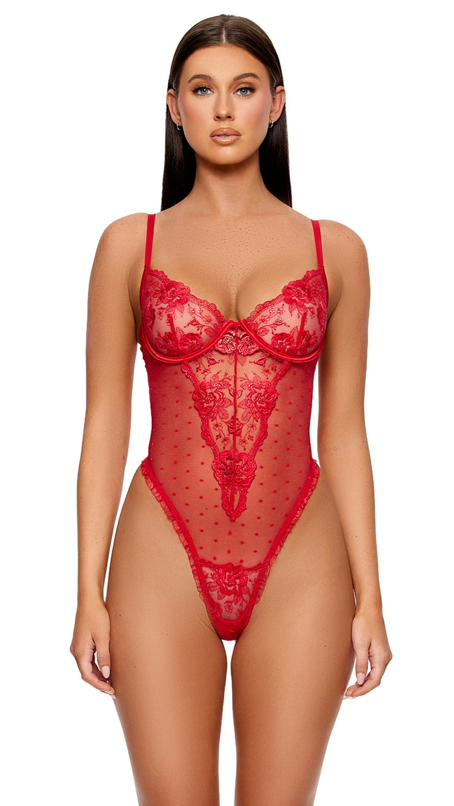 La Vie en Rose Metallic Embroidered Teddy features underwire cups, floral lace embroidery, sheer polka dot mesh, and a lace-up back. Modeled with clear platform heels on a plain backdrop.