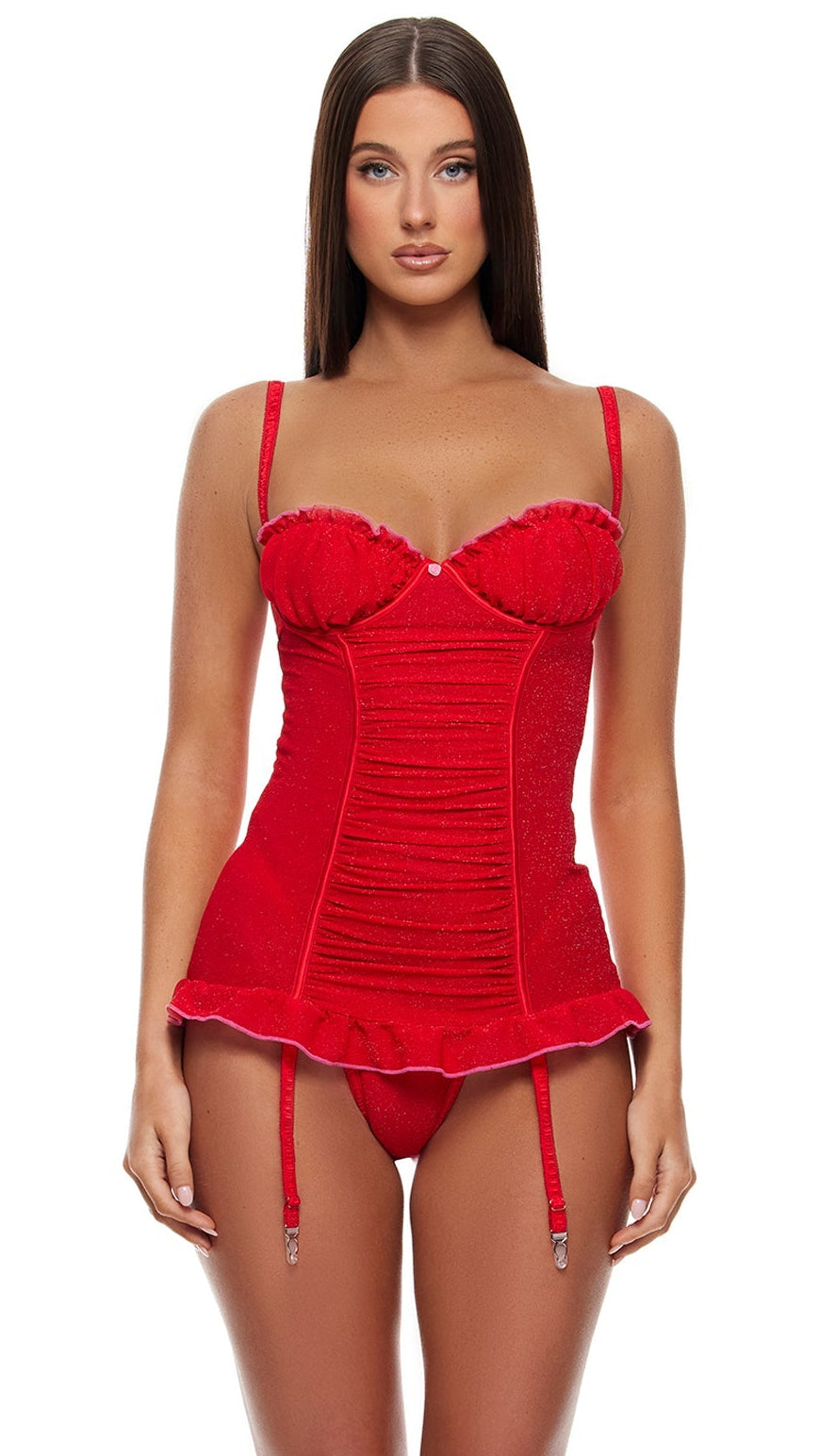 Shimmer Nights Ruched Chemise Lingerie Set features a form-fitting underwire chemise with ruched texture, lettuce edge details, and mini rosebud accent. Includes matching G-string. Model wears clear-strap heels.