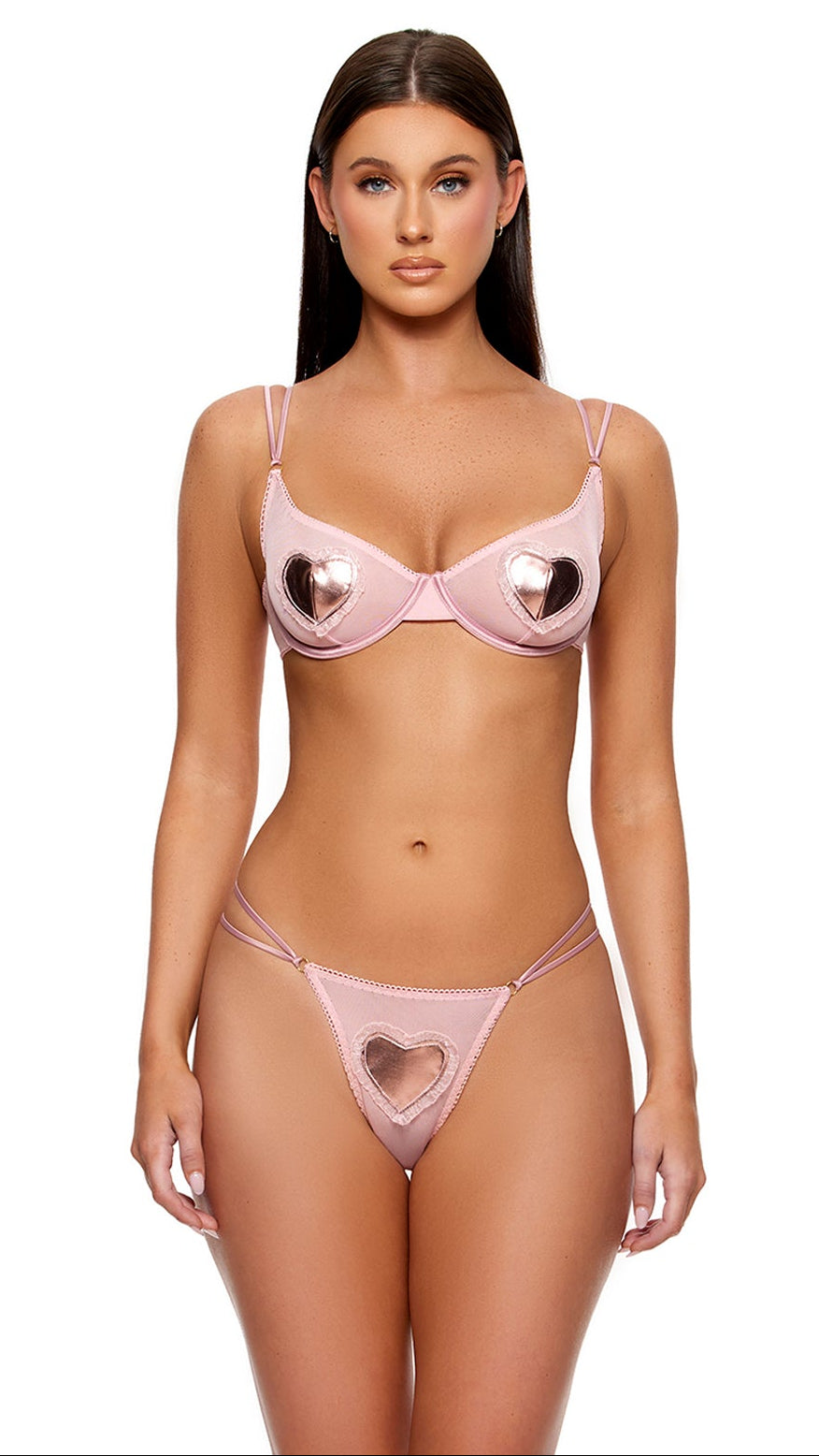 Heart of Metals Metallic Contrast Sheer Mesh Bra Set features a model in a two-piece with heart-shaped metallic accents on the bra and sheer heart detailing on the panties, complemented by clear platform heels.
