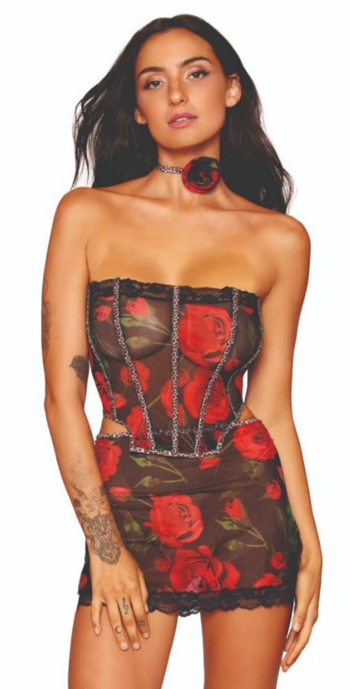 Woman modeling the Rose Print Stretch Mesh Bustier and Mini Skirt with leopard print accents, featuring a strapless neckline, lace trim, and included rosette choker necklace.