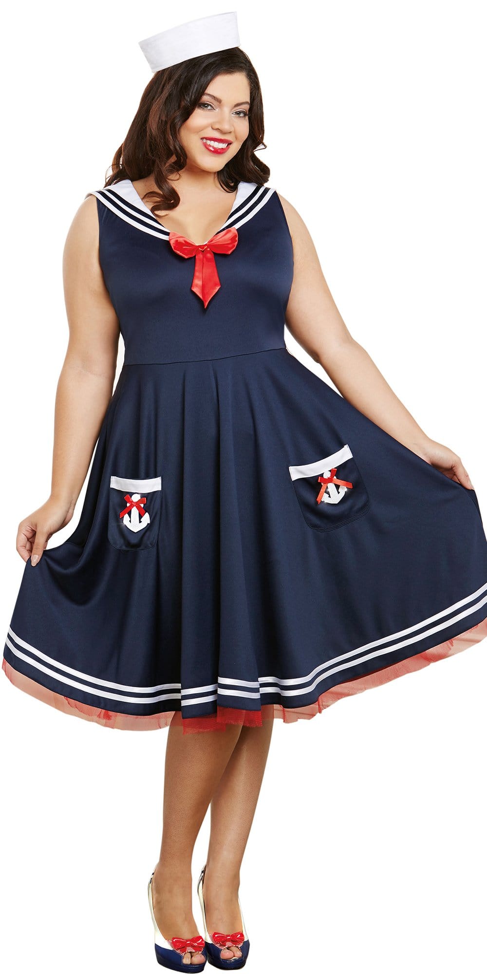 A woman models the Sexy Plus Size All Aboard Women's Costume, featuring a sailor dress with sequin anchors and an attached petticoat, complete with a sailor hat.