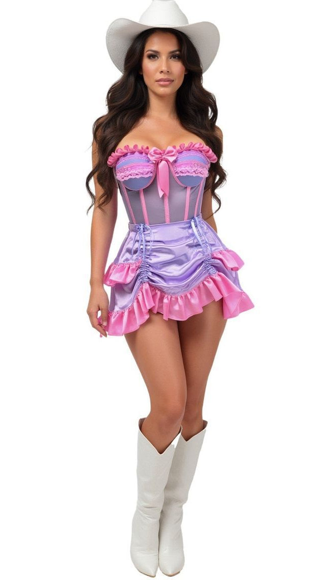 Woman wearing the Top Drawer Steel Boned Purple Pink Mesh Underwire Bustier Corset Skirt Ensemble, featuring a purple corset with pink lace trim and matching mini-skirt, complemented by a white cowboy hat and boots.