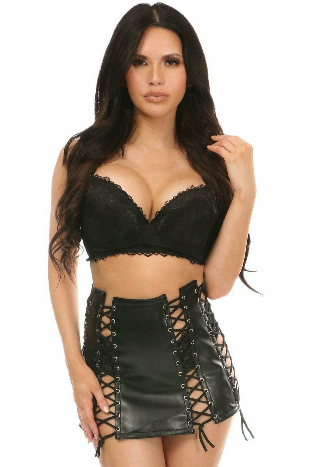 Woman wearing a Black Faux Leather Lace-Up Skirt, featuring a mini length and lace-up design, posing to highlight its stylish fit.