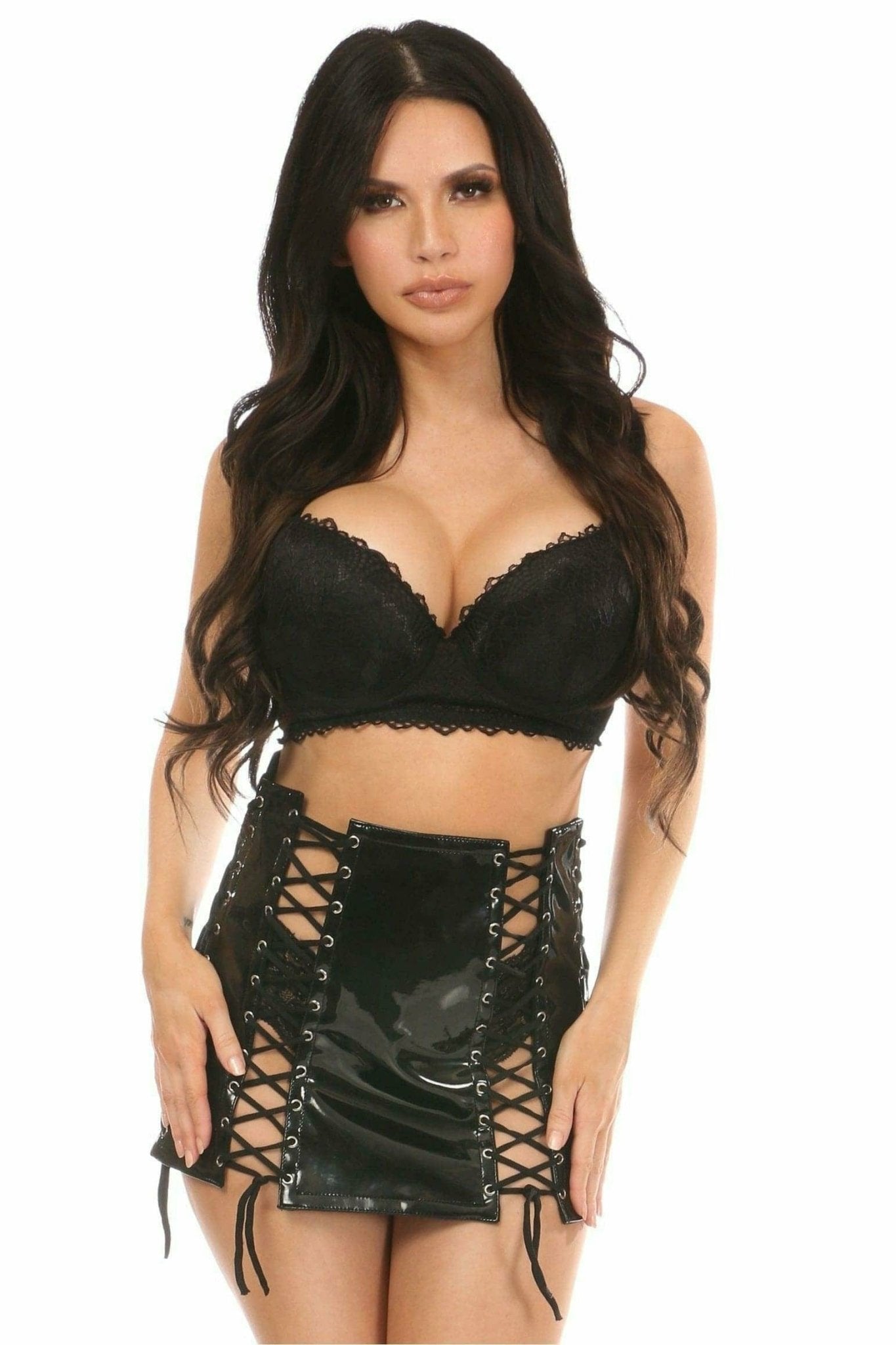 Black Patent Lace-Up Skirt with Black Lacing, worn by a woman, features a sultry lace-up front and back zipper, styled for a night out.
