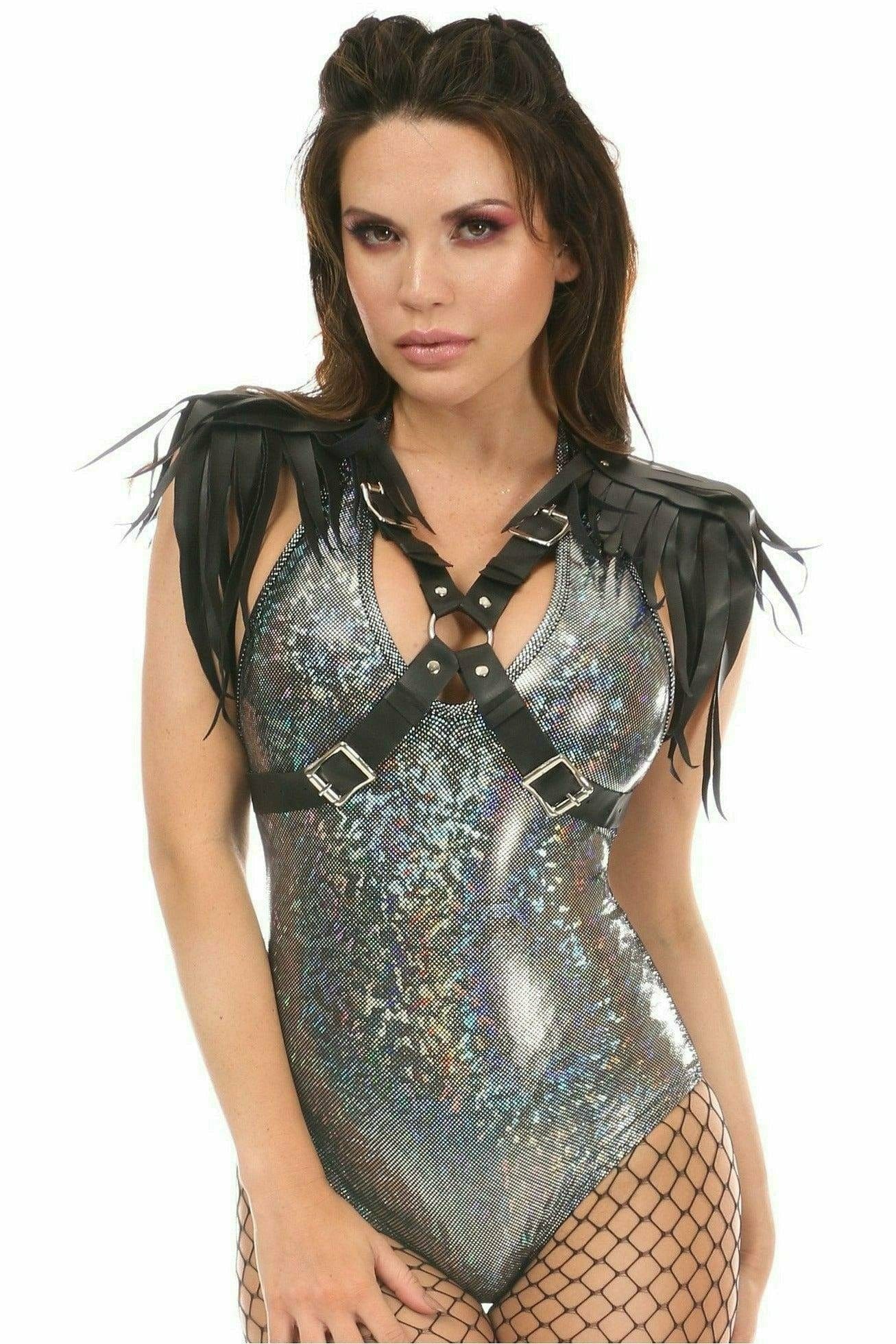 Woman wearing a Black Vegan Leather Body Harness with Shoulder Fringe, featuring chrome hardware and adjustable straps, styled with fishnet tights.
