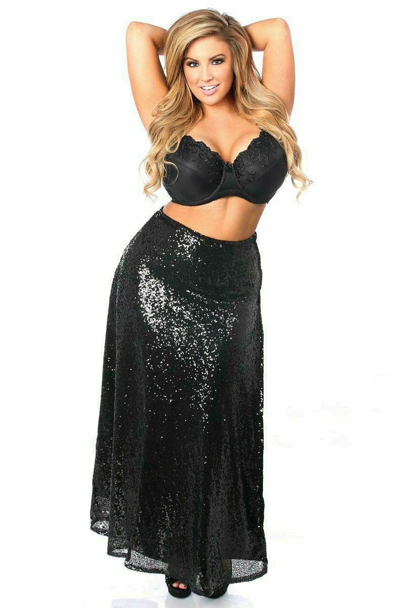 Woman modeling Deluxe Long Black Sequin Skirt with thigh-high slit and zipper closure, highlighting its elegant design in a fashion photo shoot setting.
